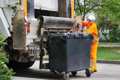 Recycling bins and materials in a Parsons Green neighborhood